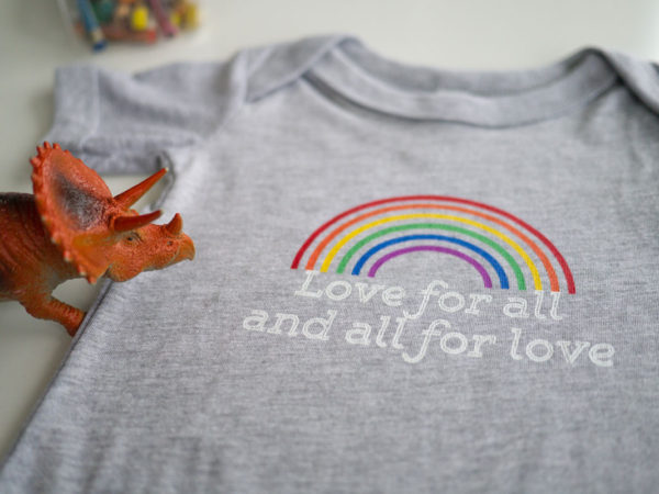 Love for All and All For Love Onesie closeup